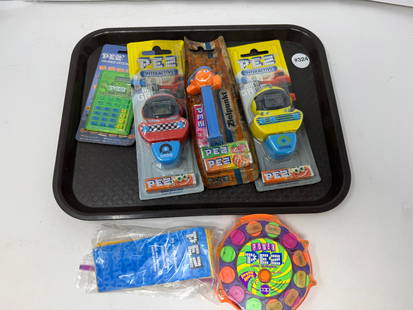 Pez Dispensers: Includes Pex mini game, candy dispenser, calculator, plus.