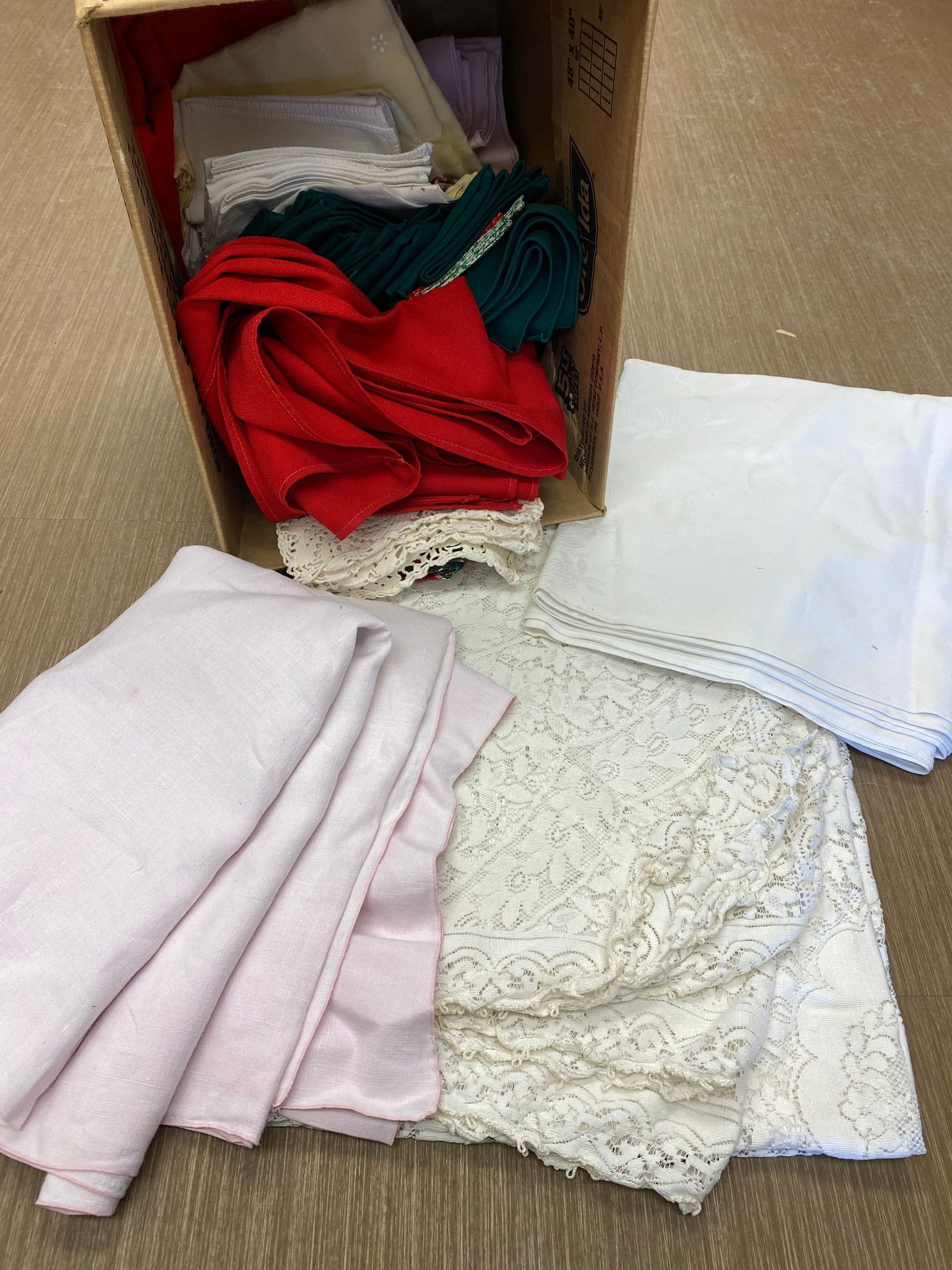 Textile Lot: Includes tablecloths, crochet items, Christmas items and more.