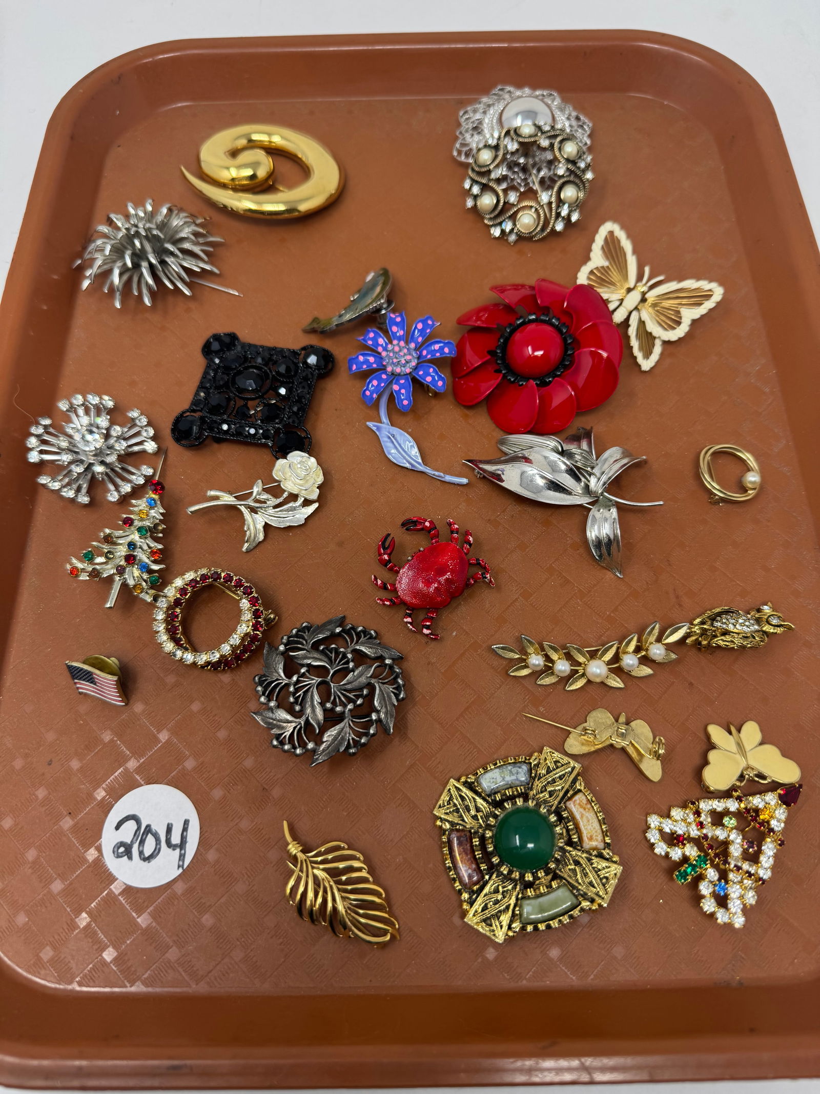 Pins and Broaches: some marked monet, coro, trifari and more. not all marked.