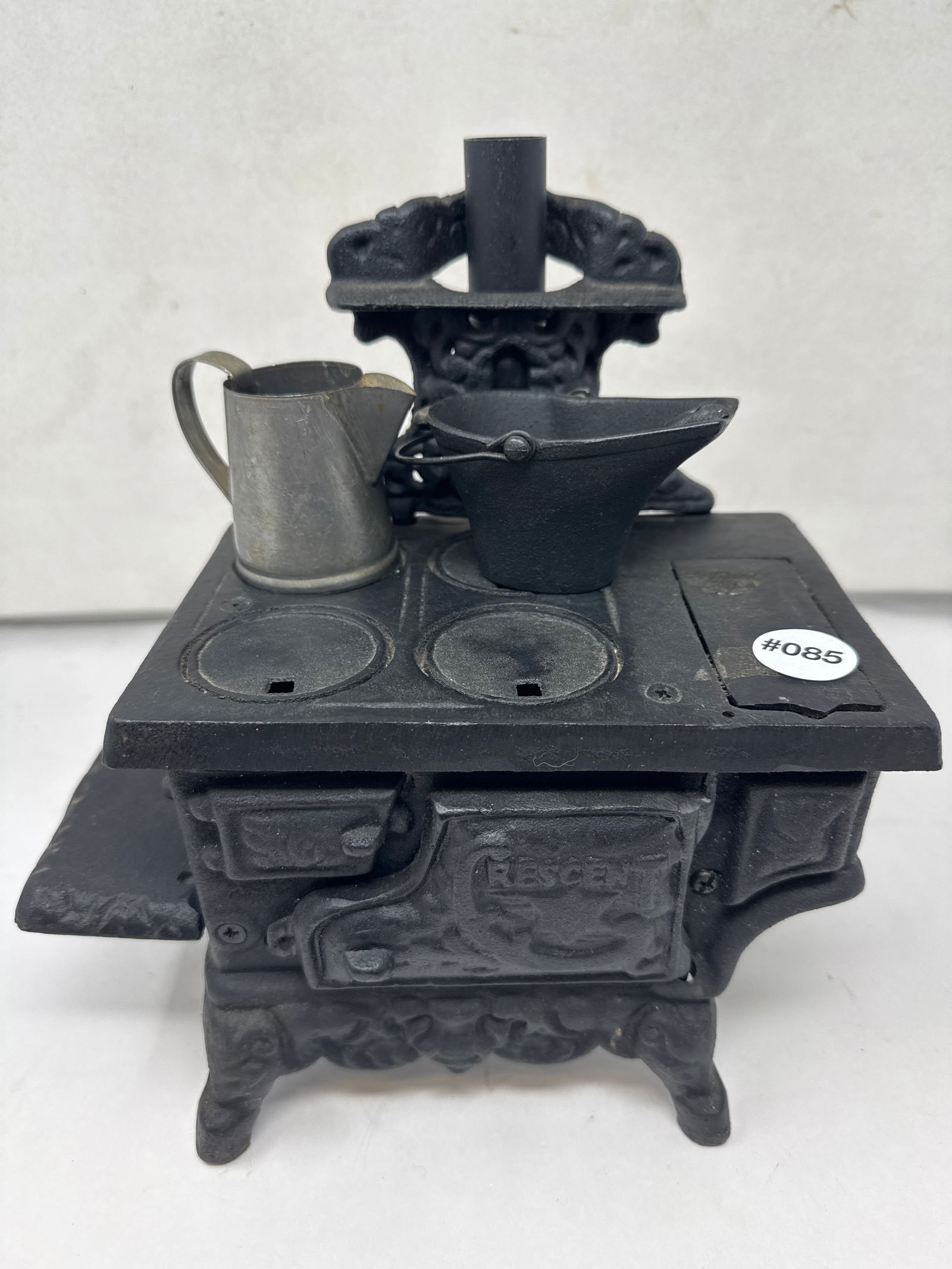 Cast Iron Cresent Stove: 12"H.