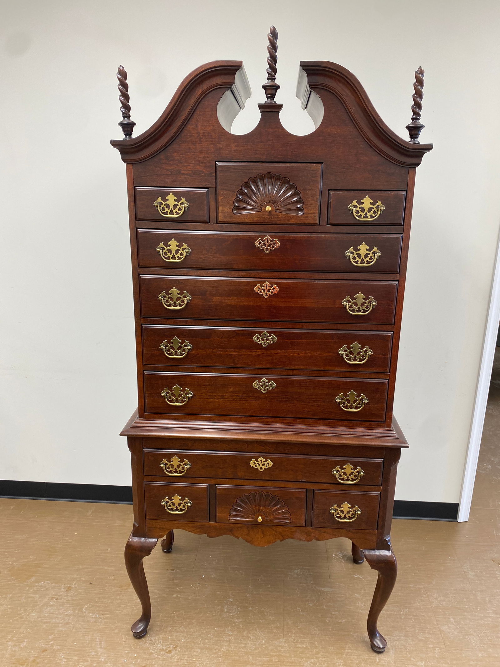 Jasper Cherry Hi-Boy: 82" x 38" x 20", has flame carved finials