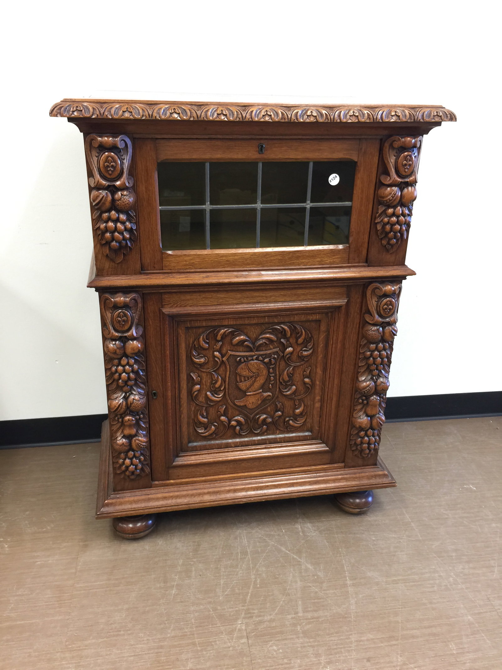 European Carved Antique Curio Cabinet: Has leaded glass. 31" x 17" x 44", ornately carved