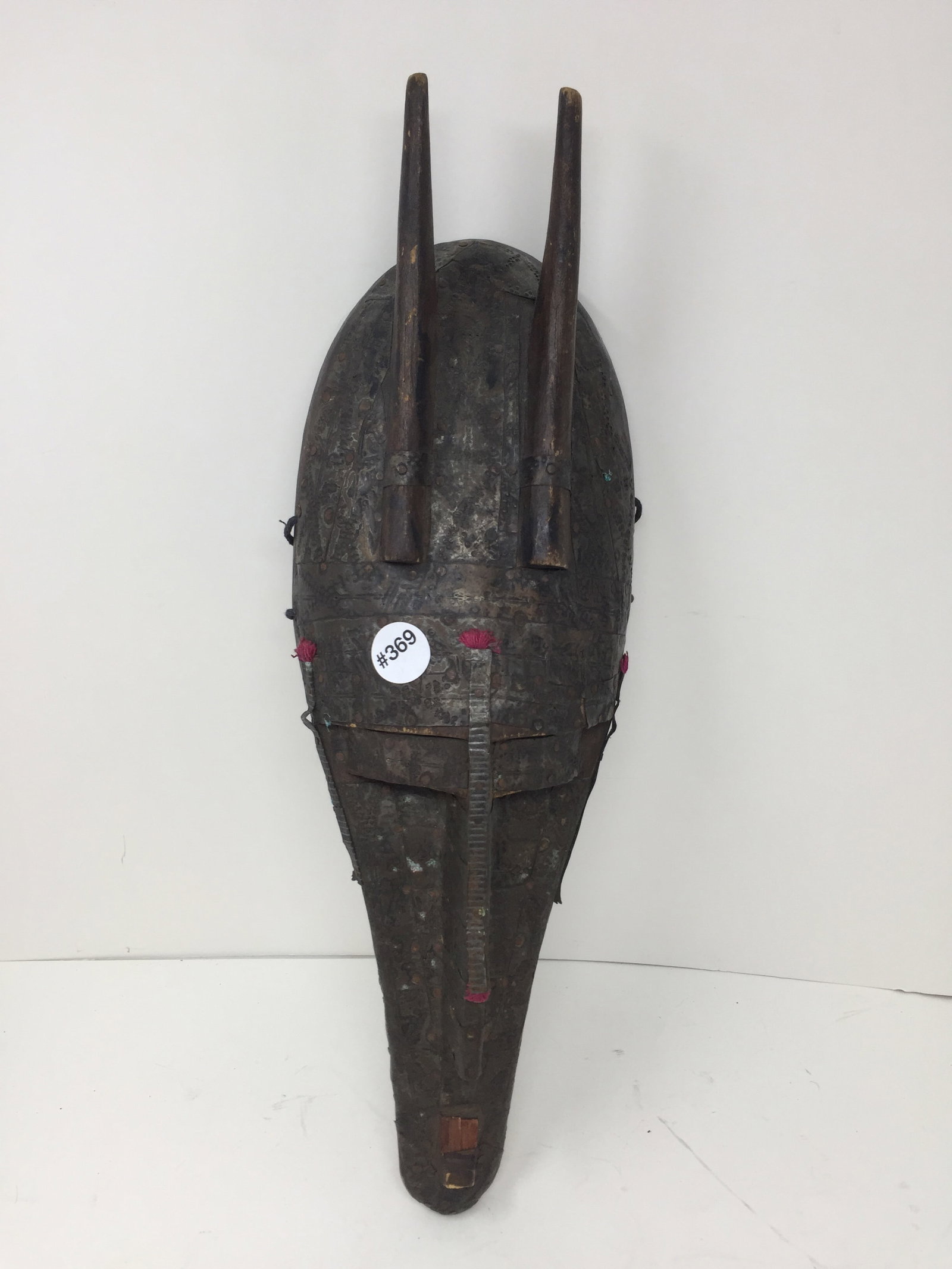 African Mask: unusual metal on face, 20"H.