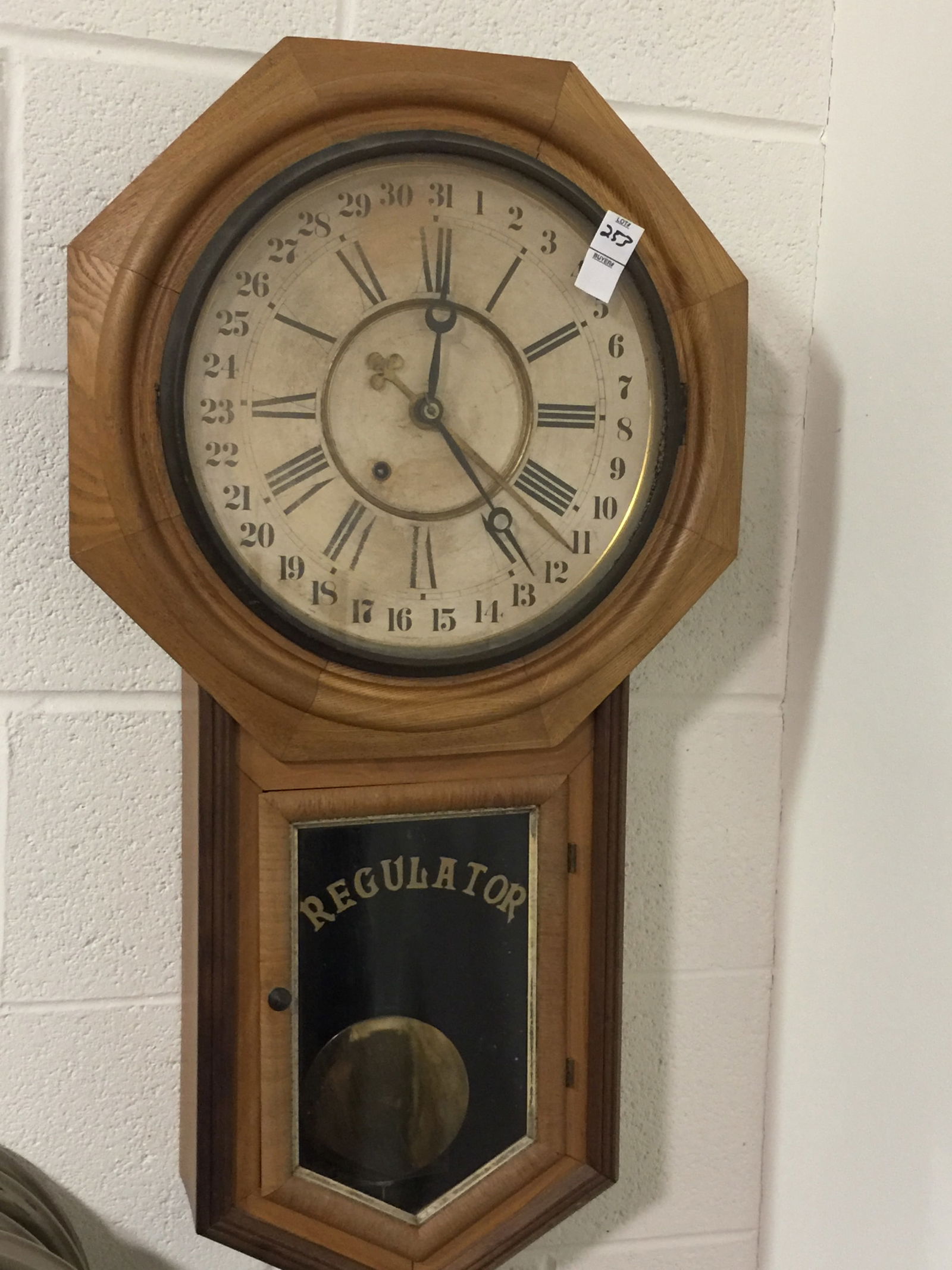 Ansonia 31 Day Calendar Regulator Clock: Has key & pendulum. 32" x 17".