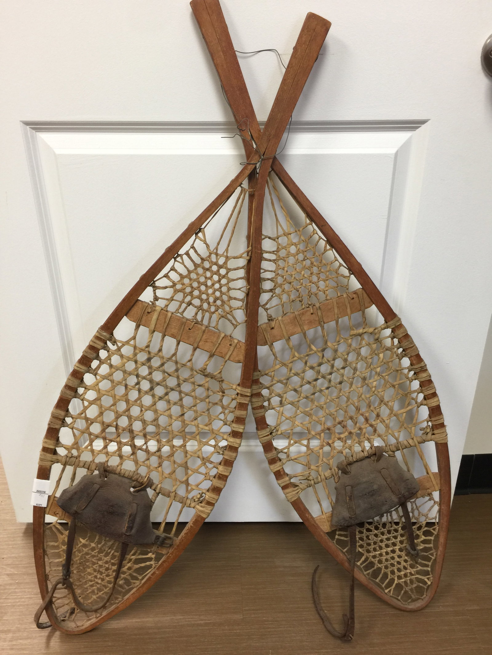Pair of Antique Snow Shoes: 42"x 12". Have original leather straps.