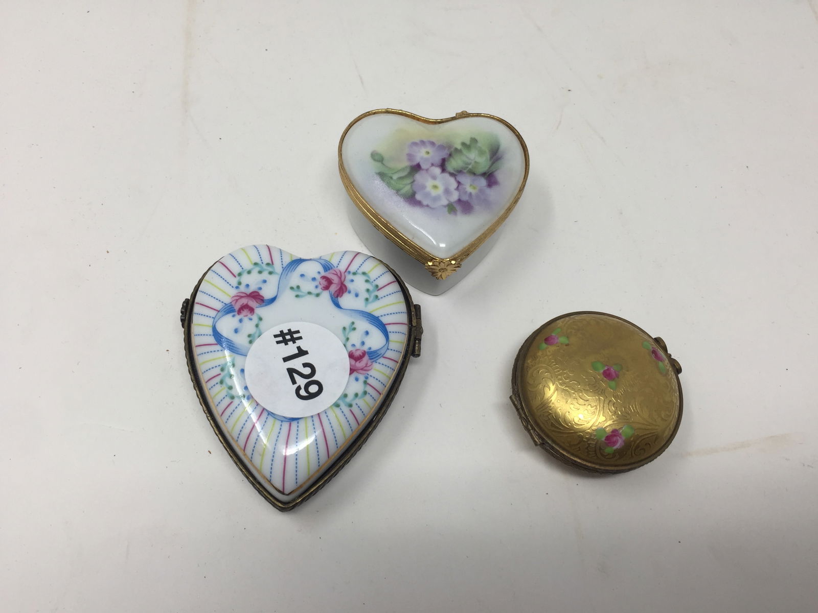 (3) Limoges Pill Boxes: all signed, hand decorated largest 2.75"H.