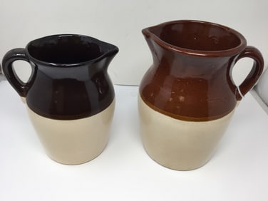 2 Milk Pitchers