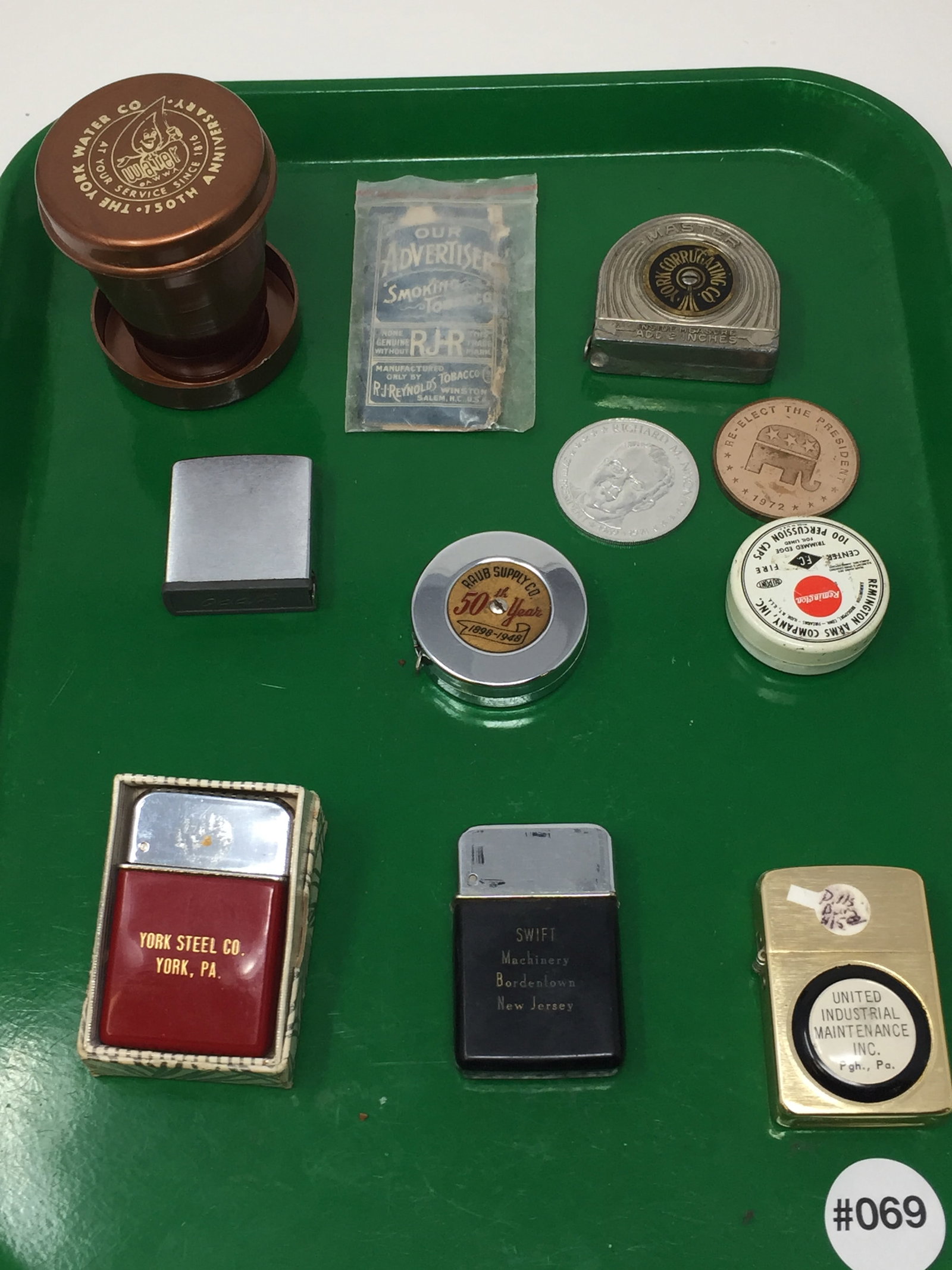 Advertising Lot: Includes advertising lighters, Zippo tape measures, and more.