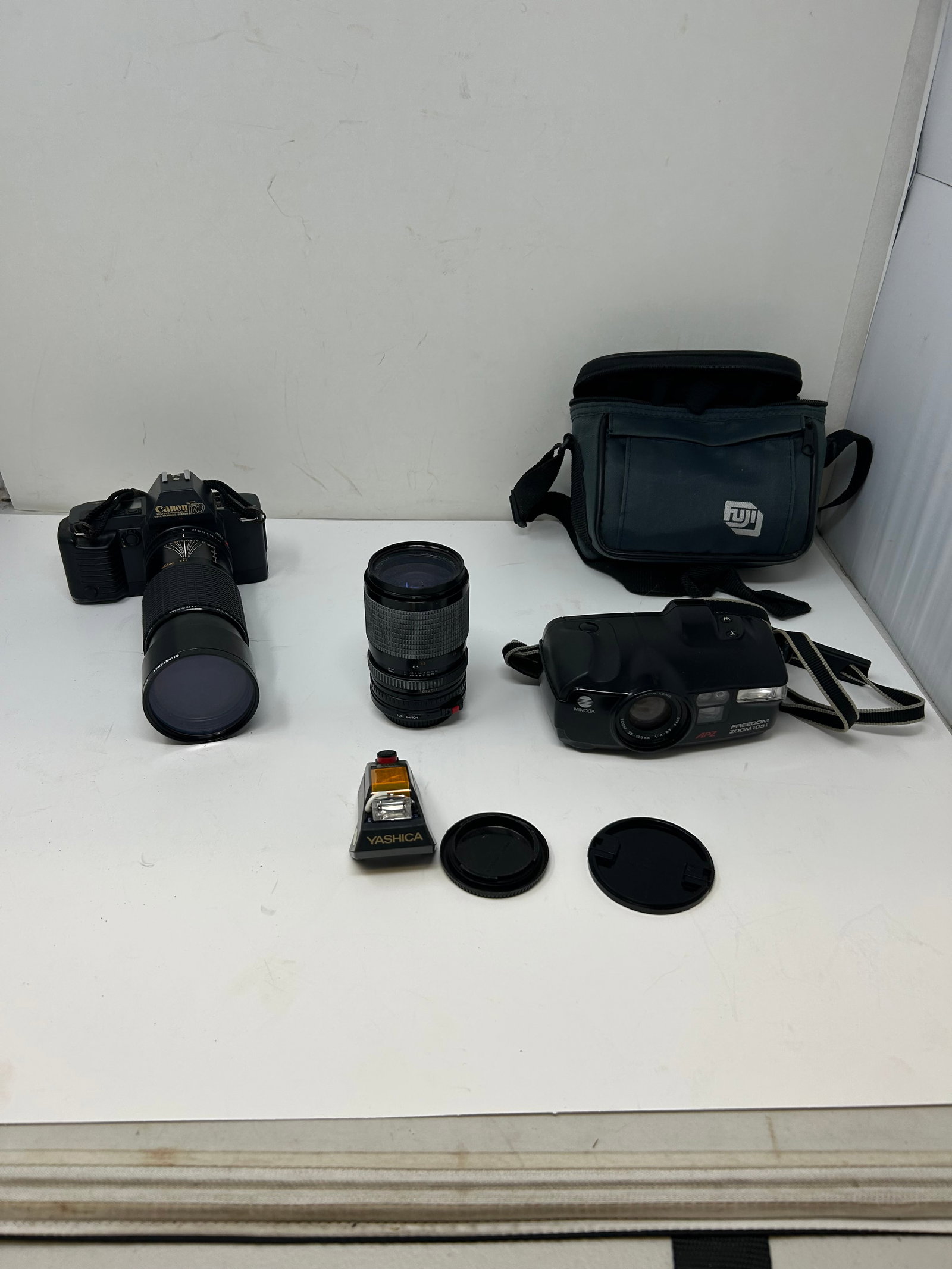 (2) Cameras: includes Freedom Zoom 105, Canon T70 with 70-200mm lens, 28-80mm lens and more