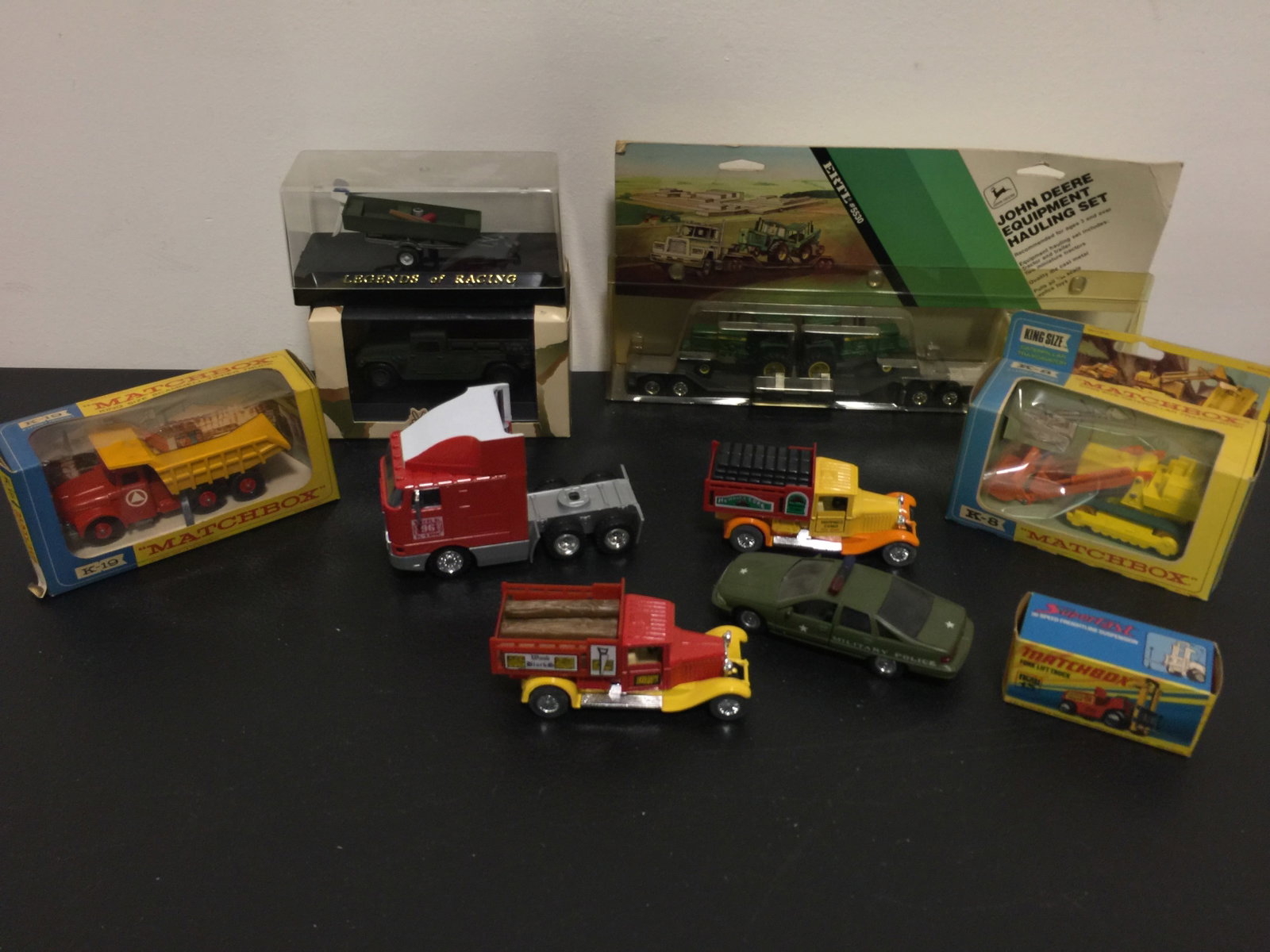 Grouping of DIecast: Includes John Deere, Matchbox, Victoria and more.