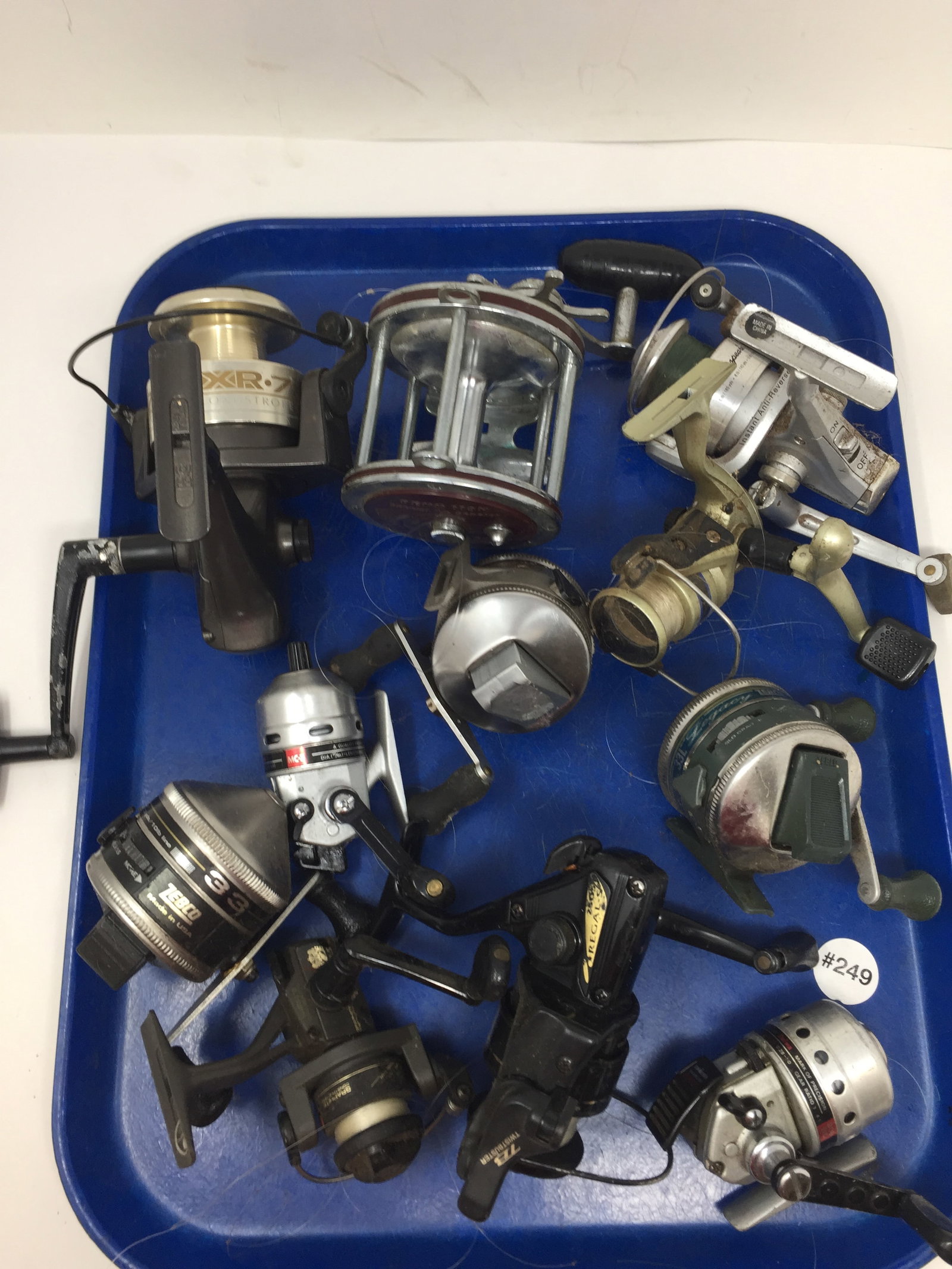 11 Fishing Reels: Some vintage. Includes Penn Special Senator, XR7 Long Stroke, Shakespeare and Zebco.