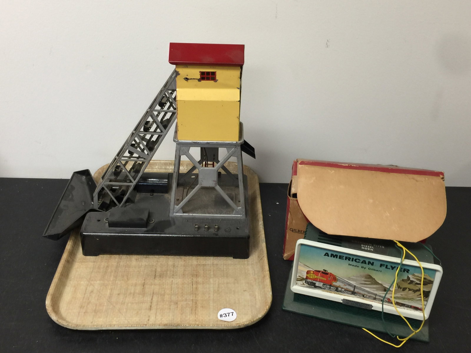 Train Accessories: Includes an American Flyer diesel horn in original 8" box, 13" H Lionel coal station.