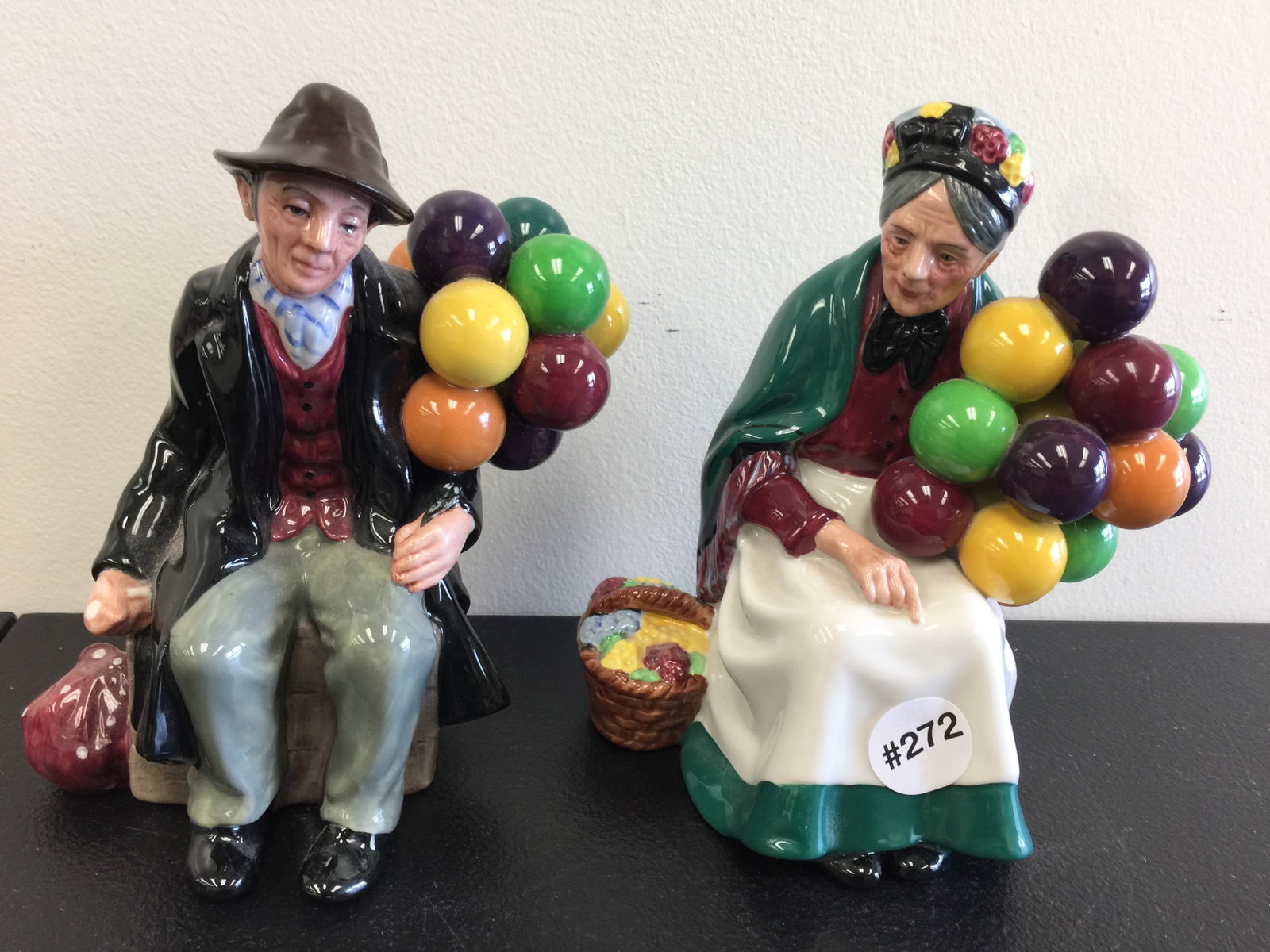 Pair of Royal Daulton Figurines: "Old Balloon Seller" & "The Balloon Man". 7" H.
