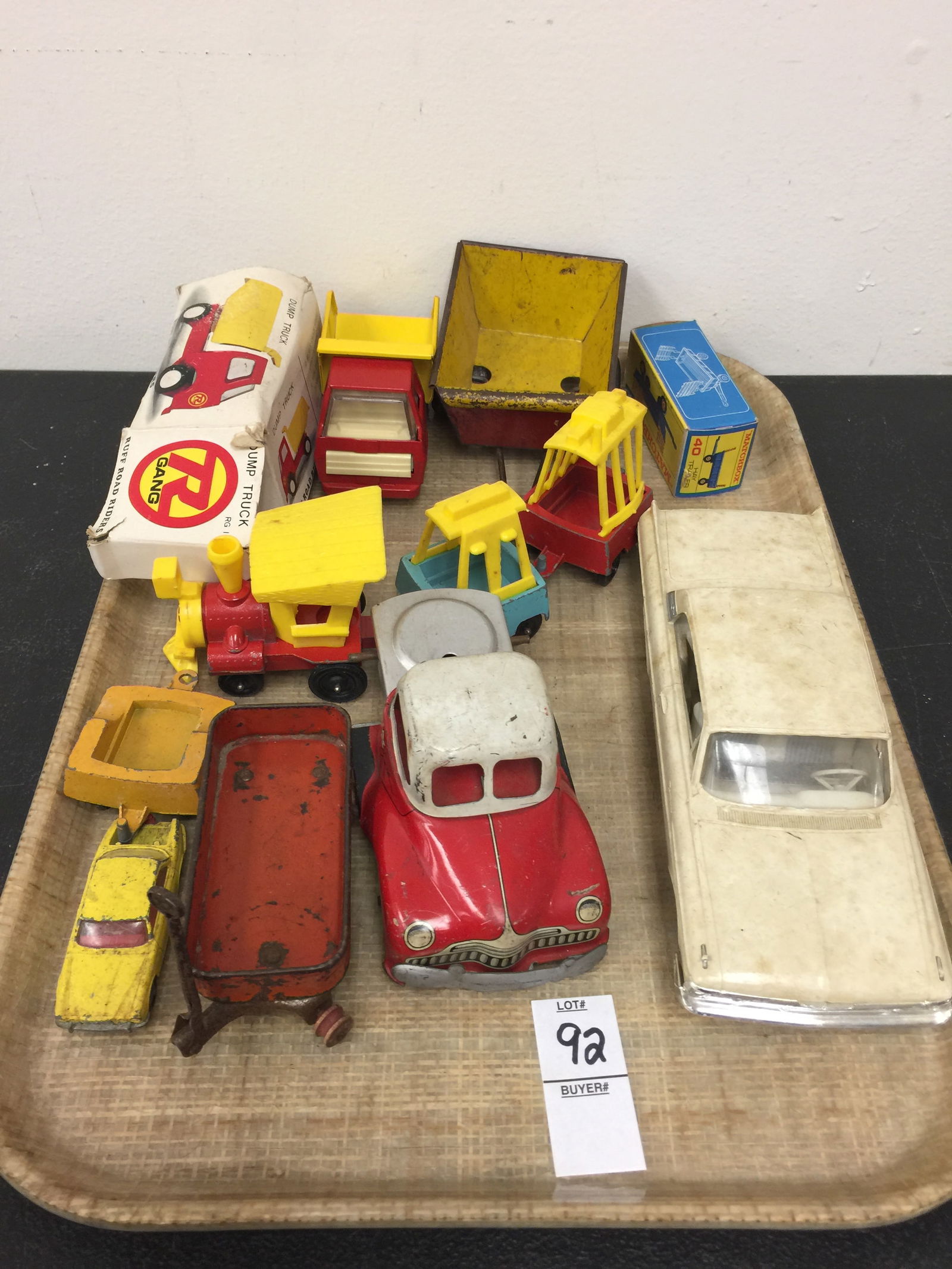 Assorted Toys: matchbox, other cars and pressed steel toys.