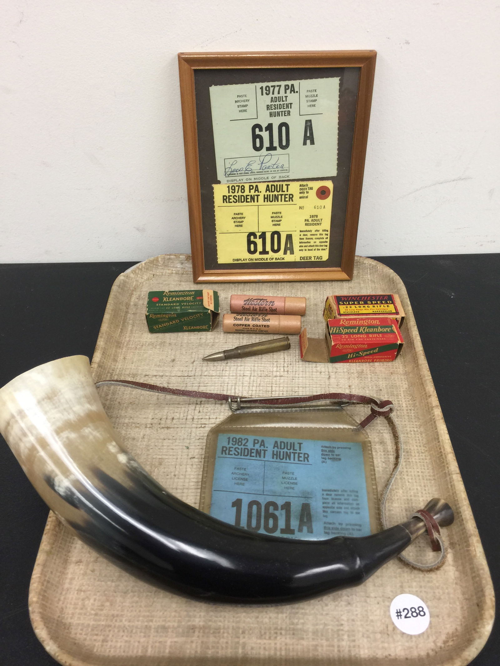 Vintage Sportsmans Lot: Includes a 12" powderhorn, vintage hunting license and ammunition. THIS ITEM NOT AVAILABLE FOR SHIPPING.
