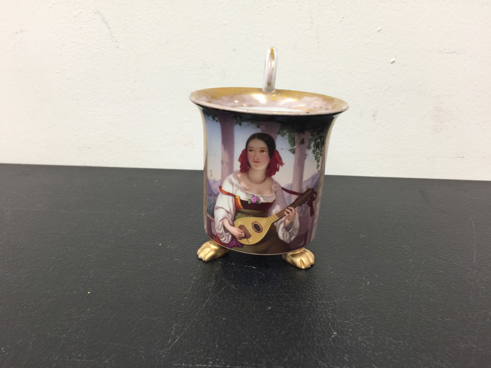 KPM Portrait Cup: hand painted portrait of female musician, 5"H.