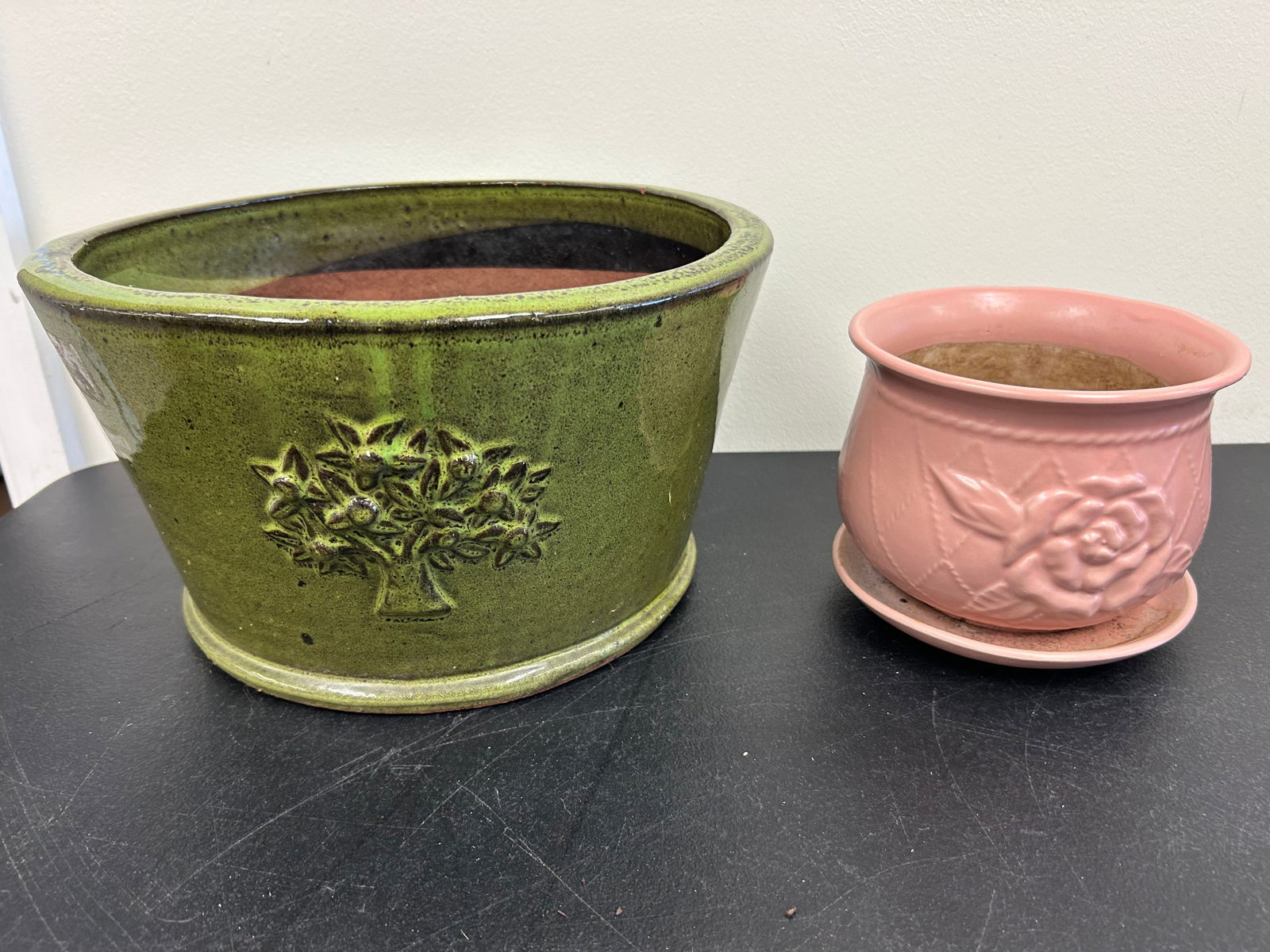 2 Planters: Largest 13" W, redware.