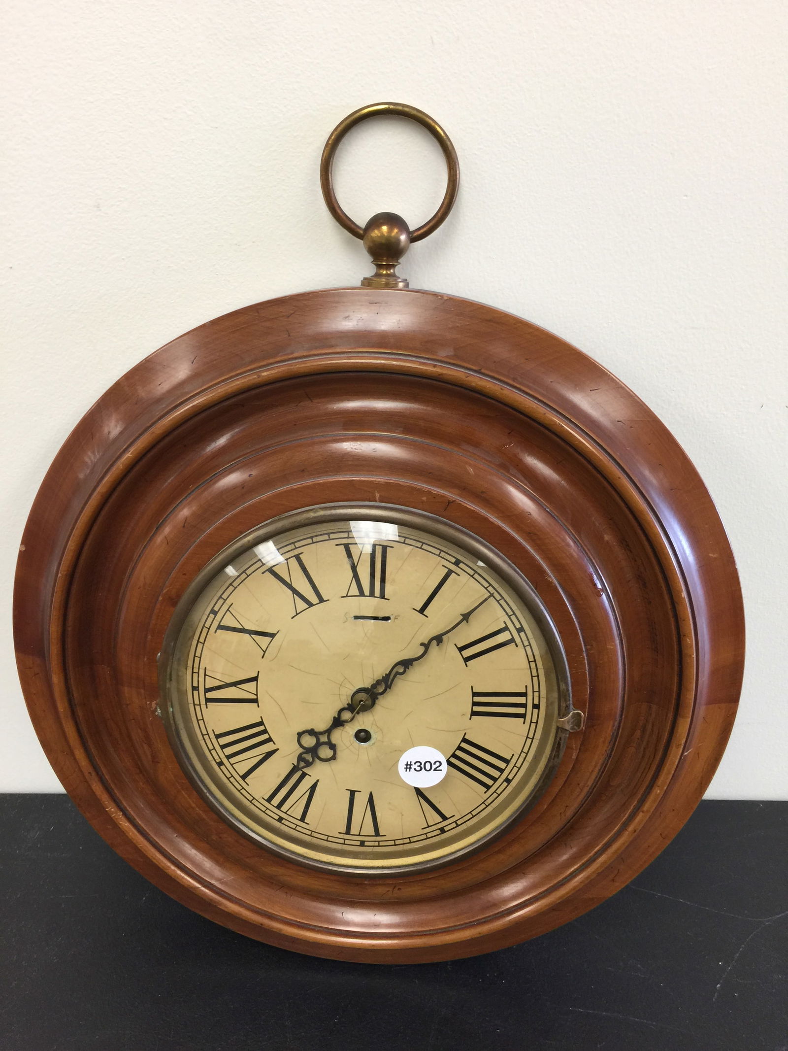 Clock: walnut frame, 17"W.