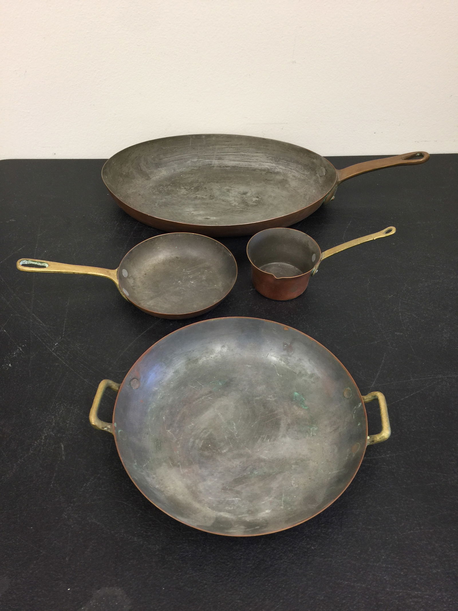 4 Vintage Copper Pots: Largest 16", signed on bottom.