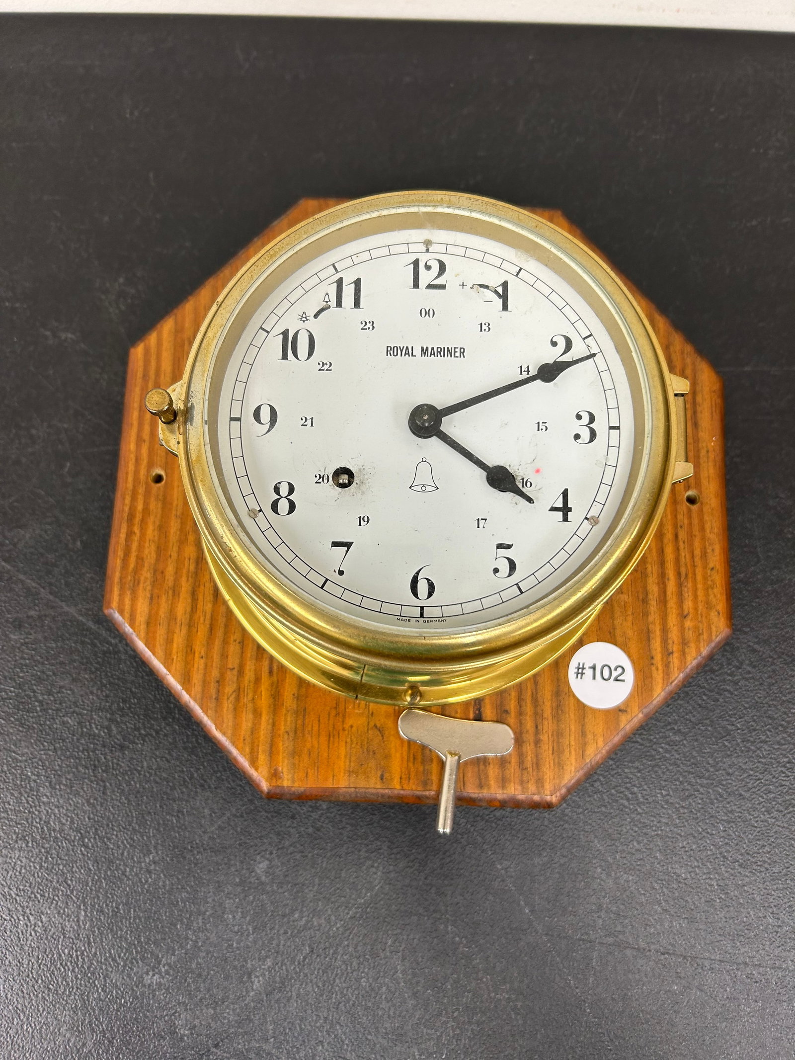 Royal Mariner Ships Clock: German made, mounted on a 10" oak board, clock is 7" round