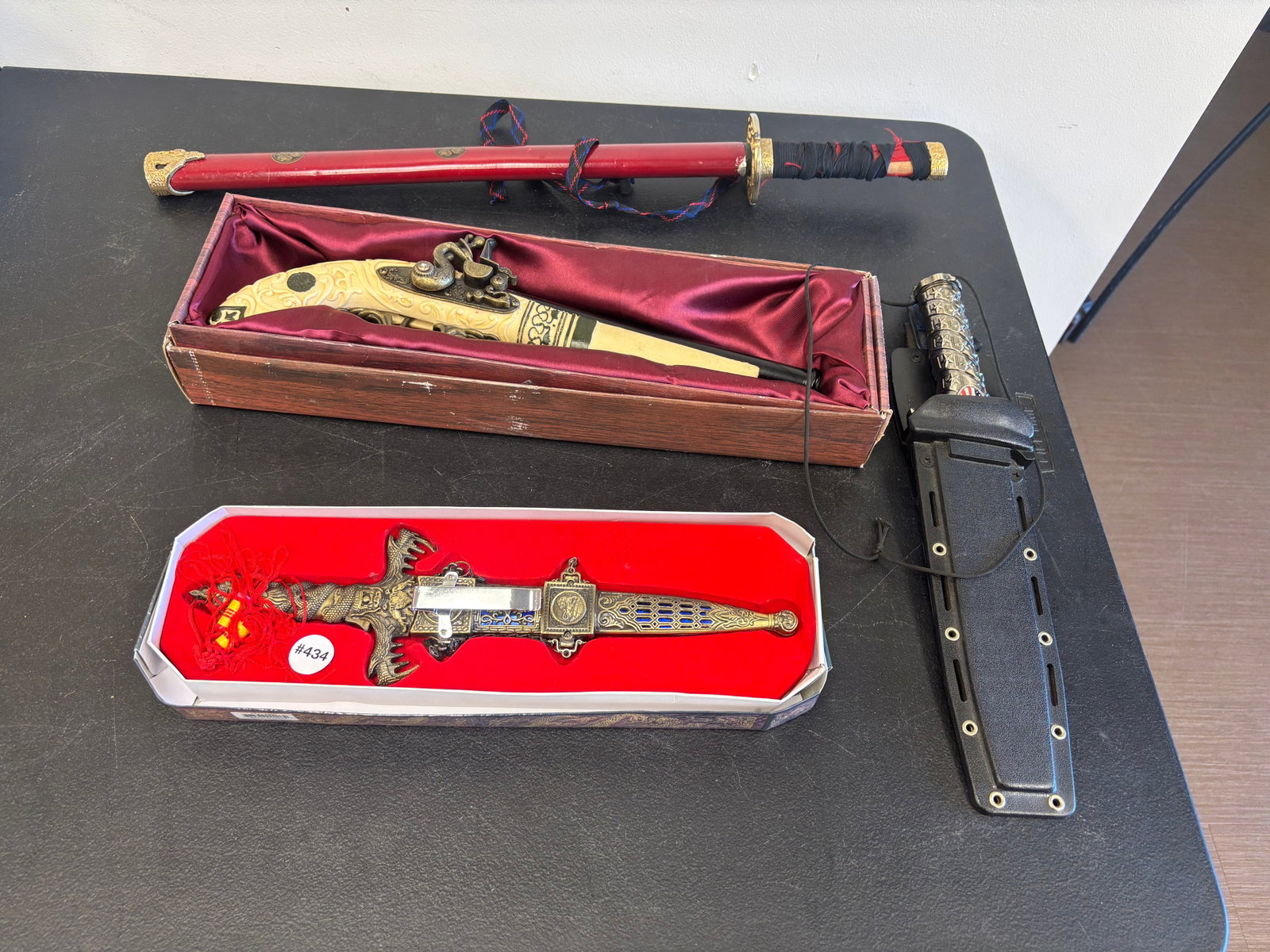 (4) Replica Weapons: samurai sword, flintlock pistol plus.