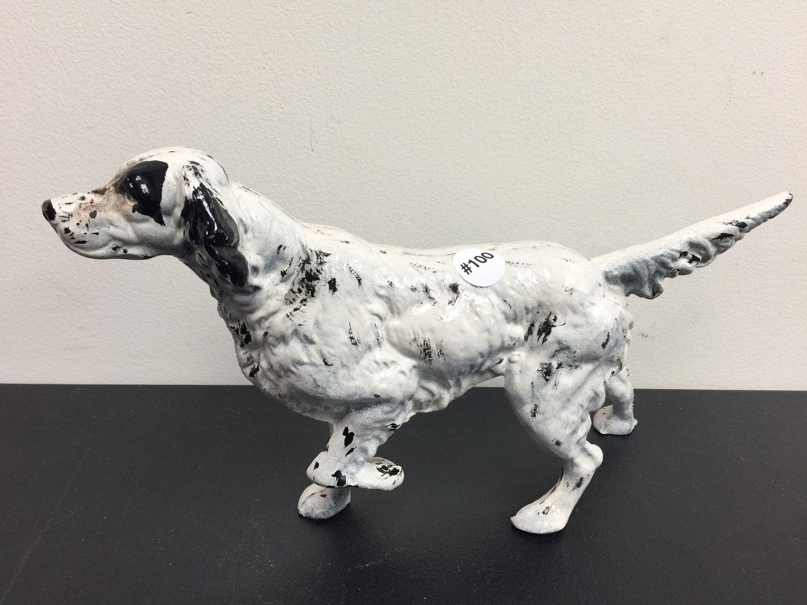 Cast Iron Doorstop: Hand painted. 15" L.