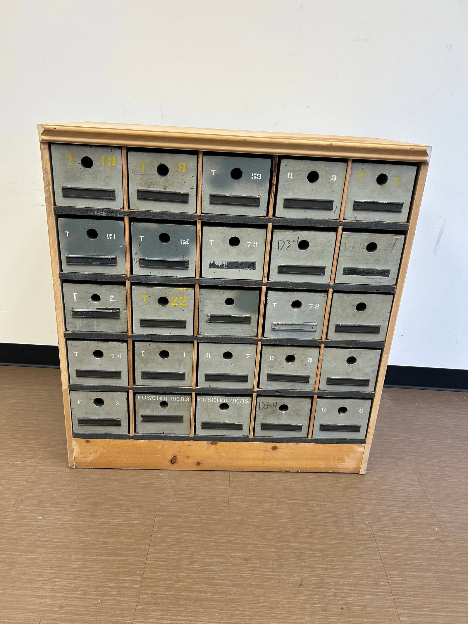 Primitive Style Organizer: 37" x 19" x 40", has 25 early divided drawers with newer base