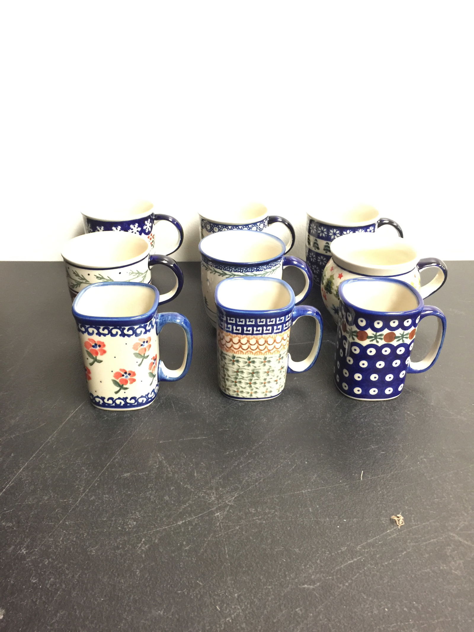 9 Polish Pottery Mugs: tallest are 4"