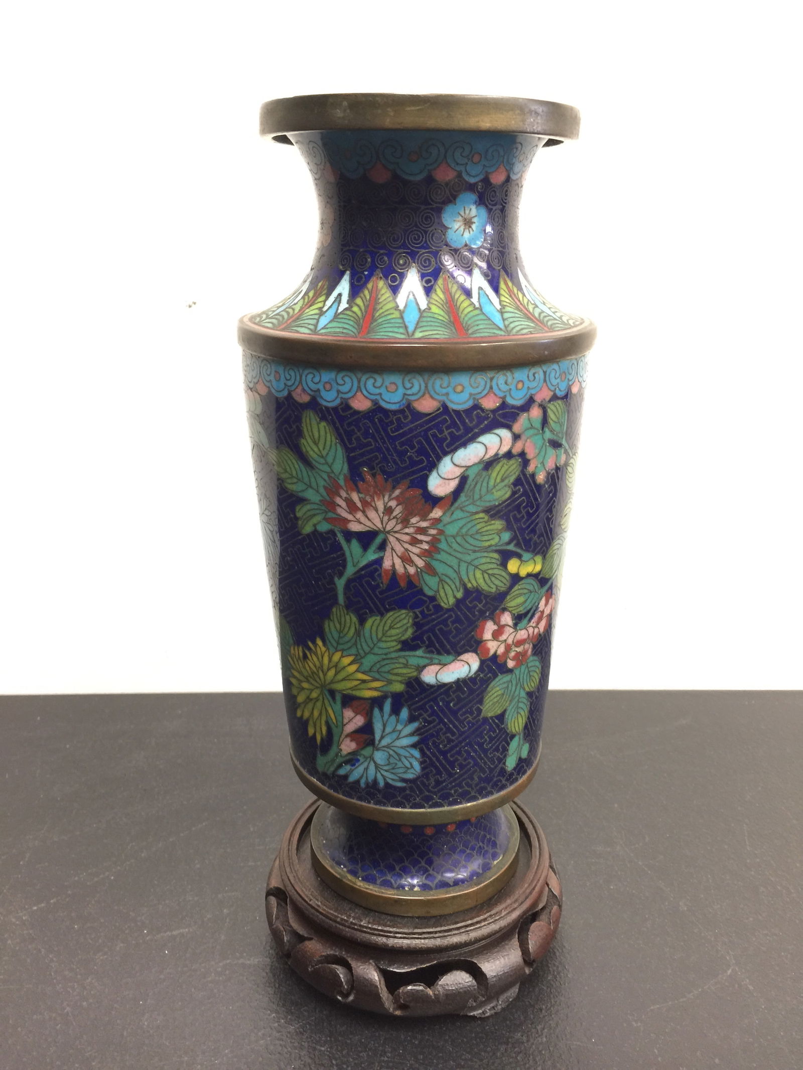 Antique Cloisonne Vase: 9" H. sits on carved rosewood base.