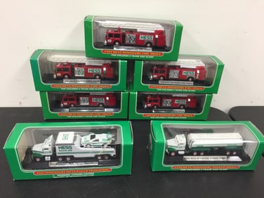 7 Miniature Hess Trucks