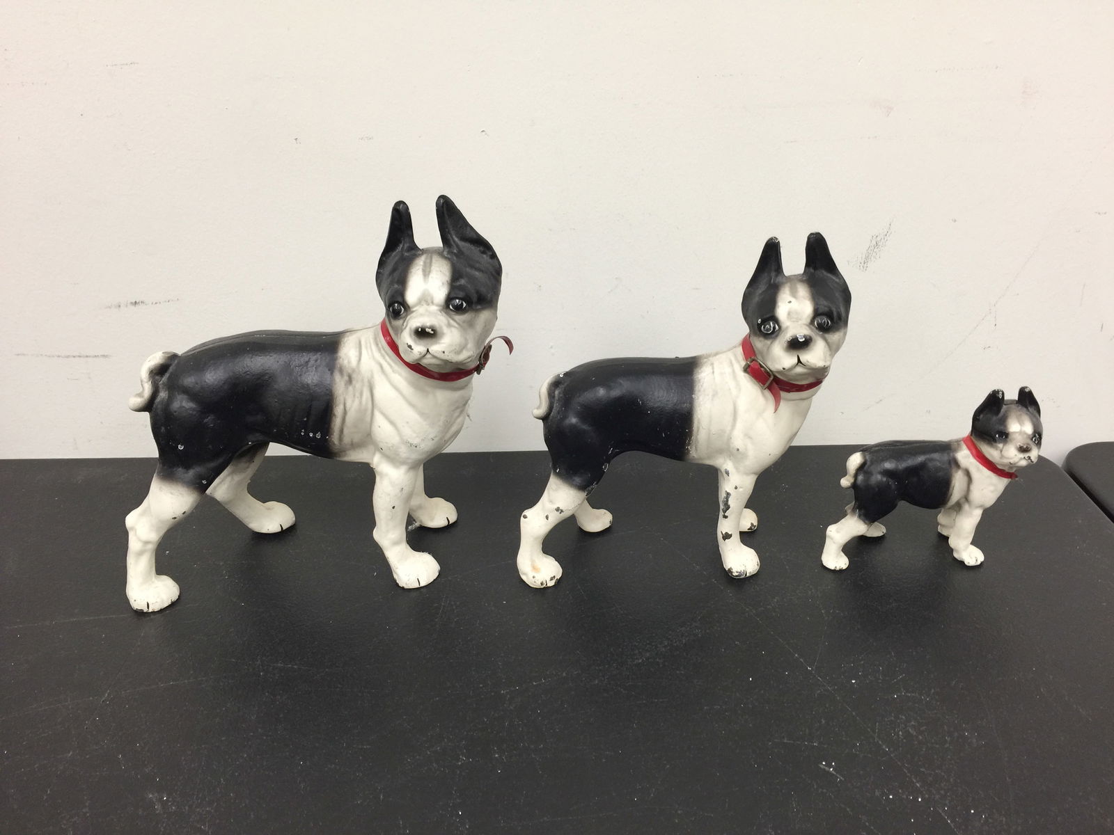 Graduated Set of Boston Terrier Door Stops: cast iron. Largest 9.5" L, smallest 5" L.