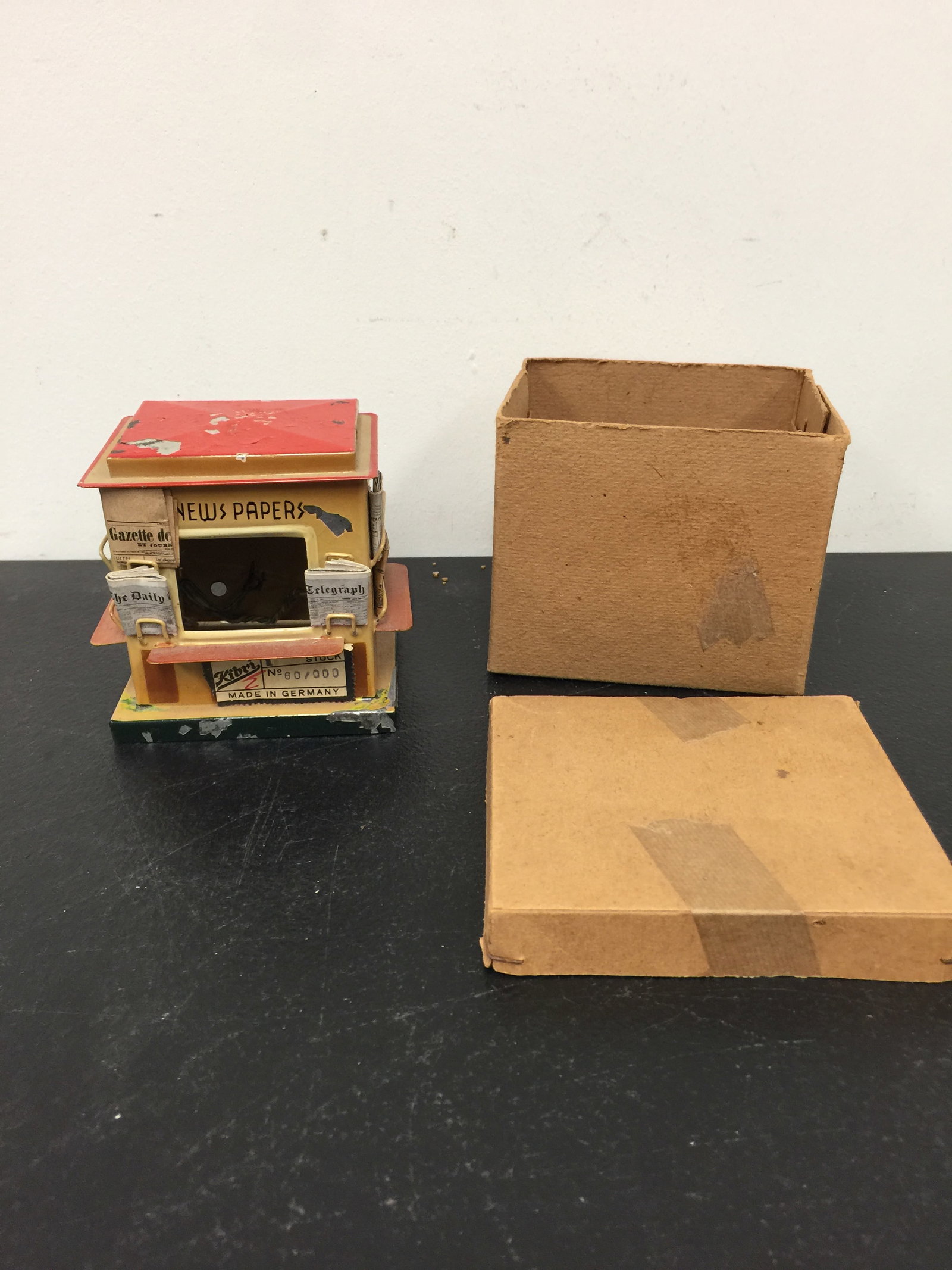 Kibri Tin Litho Newstand: with original box, signed on bottom, 4" x 4"