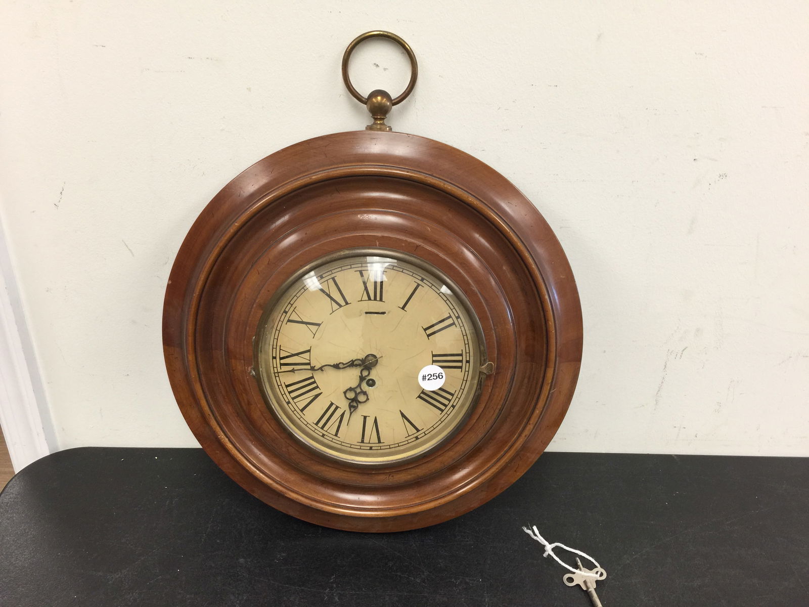German Wall Clock: Has key, 17" W.