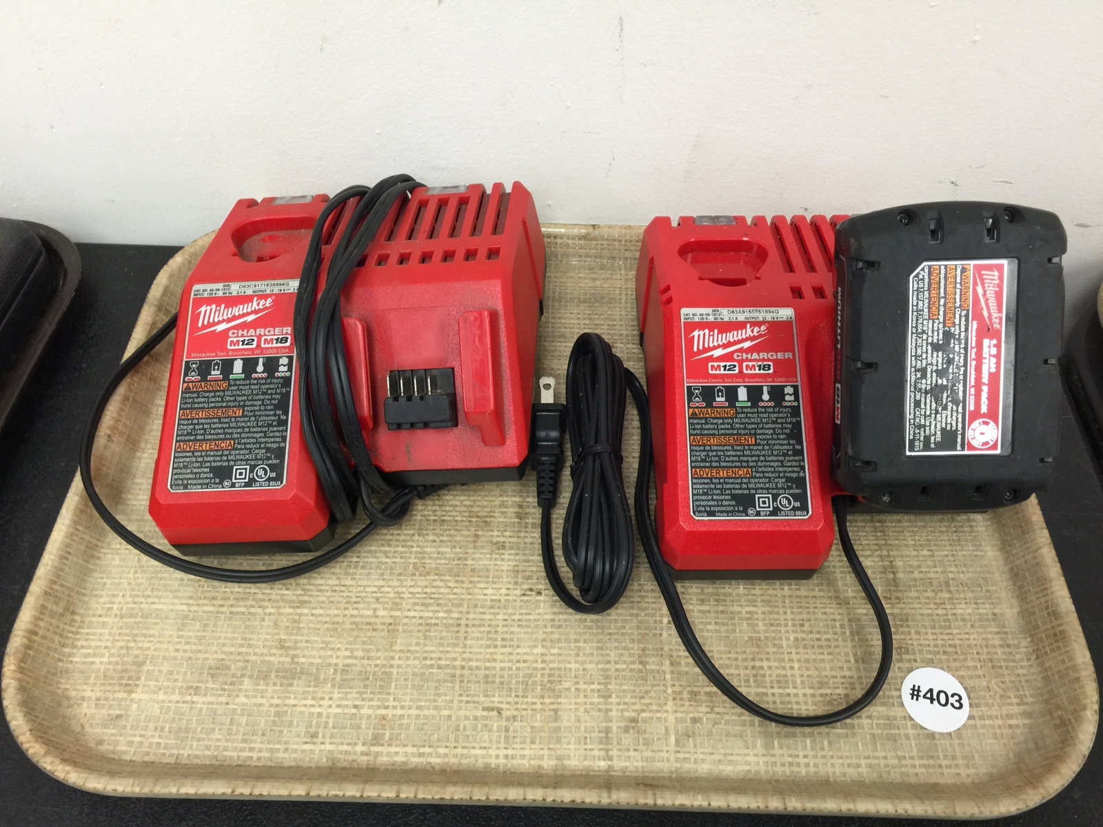 2 Milwaukee Chargers: Both are M-12, M-18. with batteries, 7" L.