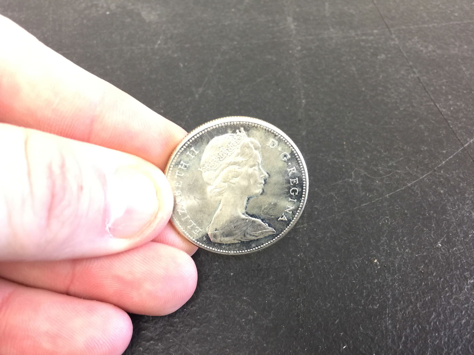 Canadian 50 Silver Dollar: 80 percent silver, centennial dollar.