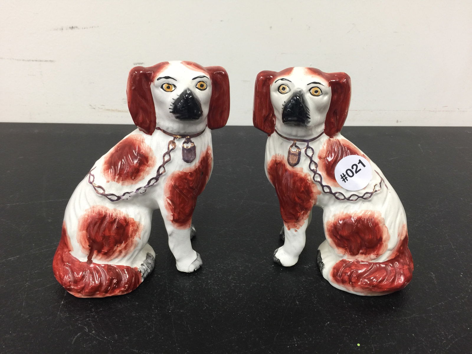 Pair of Antique Staffordshire Dogs: Portholes on base. 6" H.