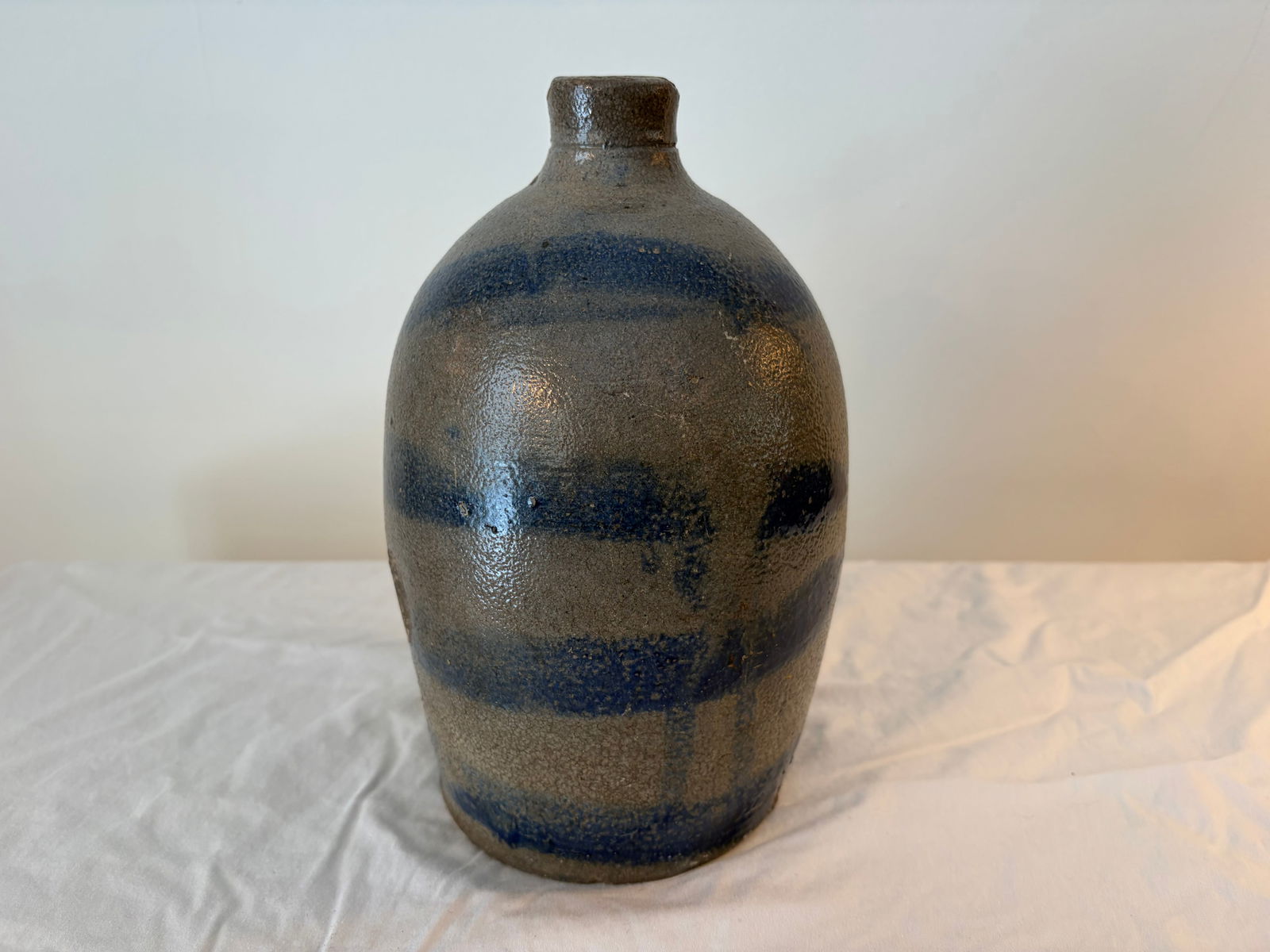 Western PA Four Strip Stoneware Jug: four stripes, 9"H.