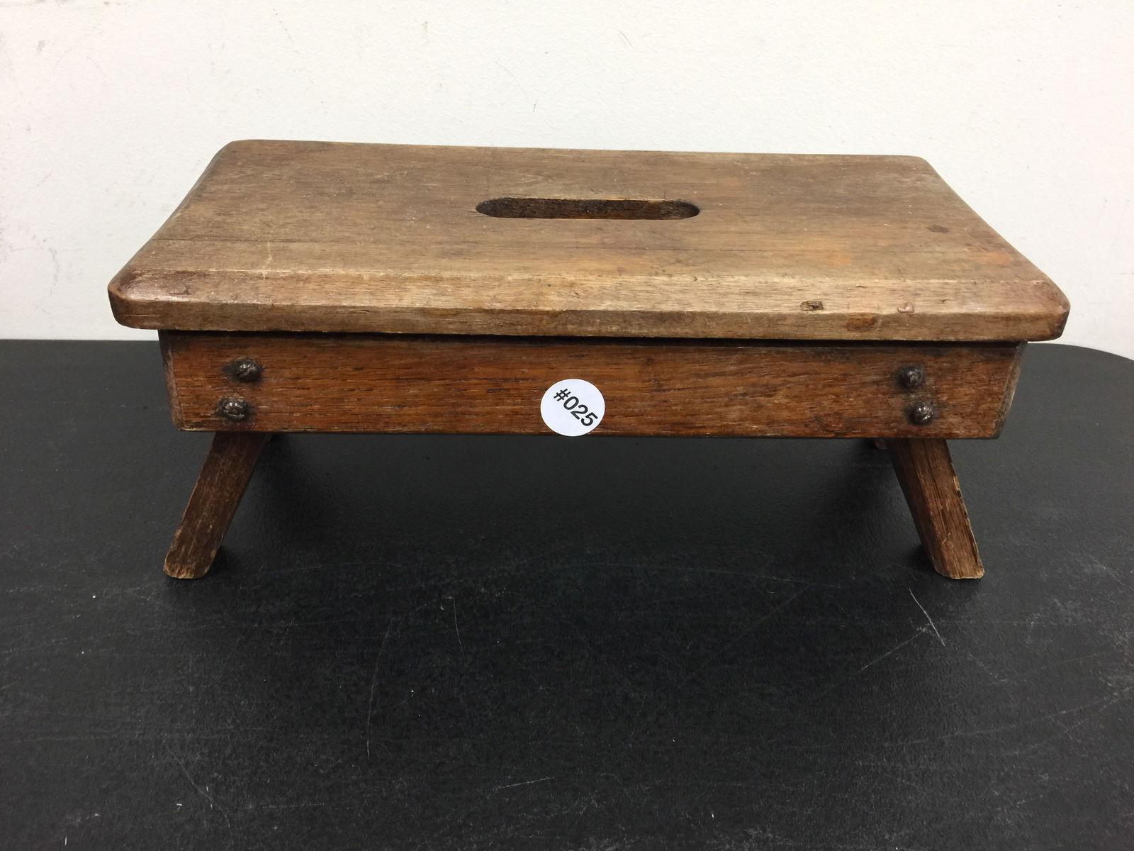 Primitive Foot Stool: 15" x 6". Cutouts on feet.