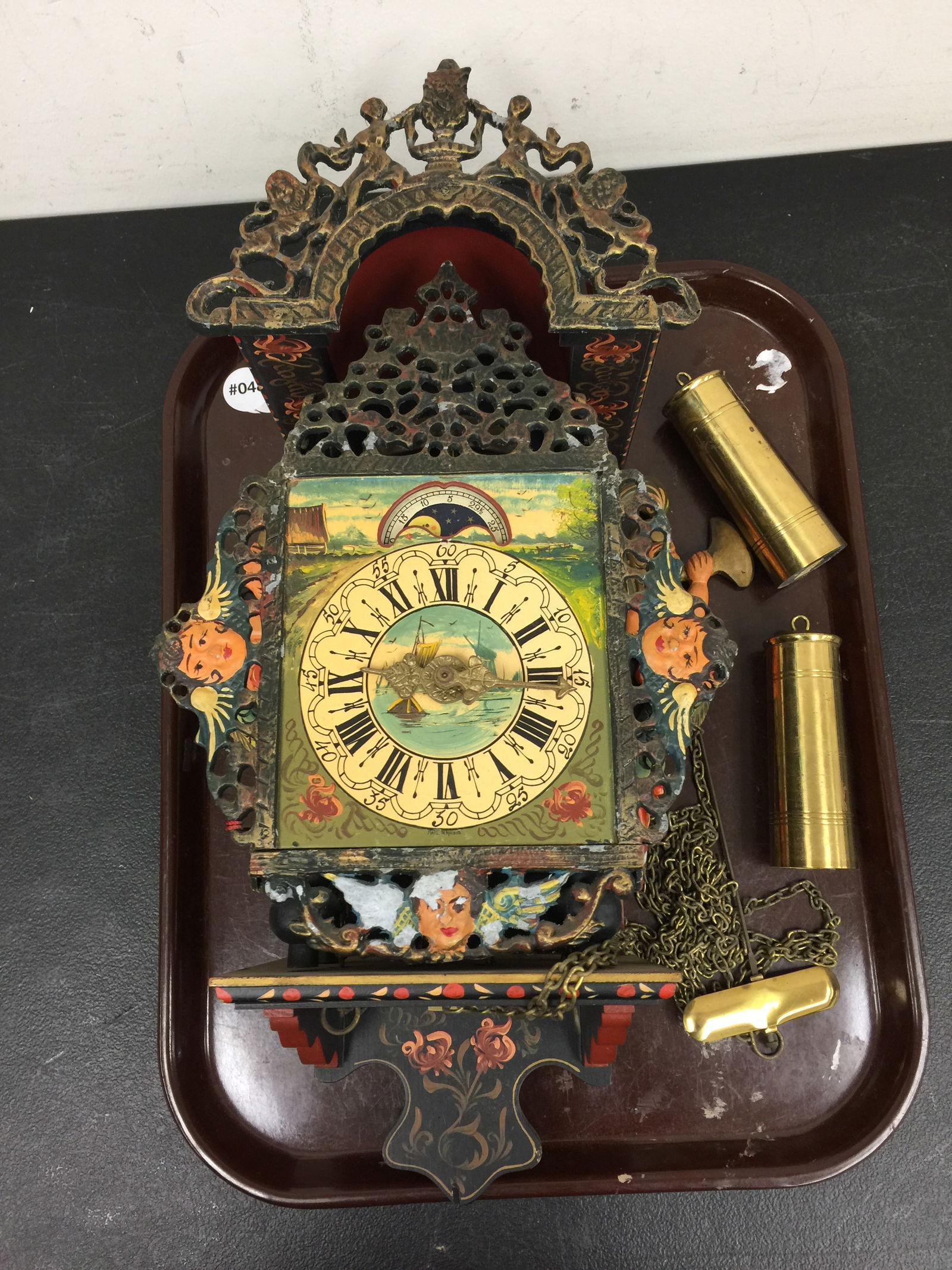 Dutch Folk Art Wall Clock: hand painted, includes weights and pendulum. 21"H.