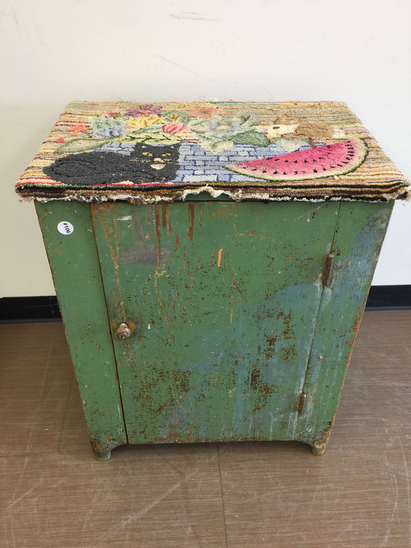 Primitive Green Painted Cupboard: hooked rug on top, 24"x18"x30".