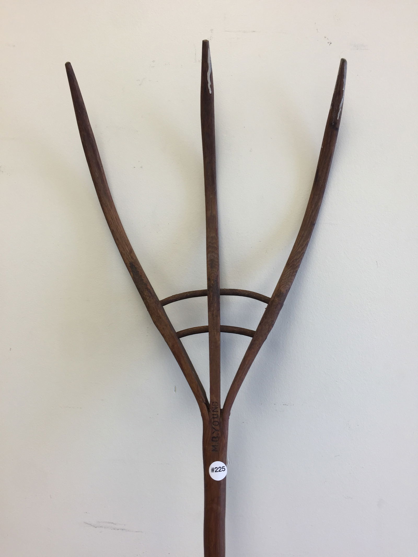 Signed Primitive Fork: Signed "MB Young". 67" x 15".