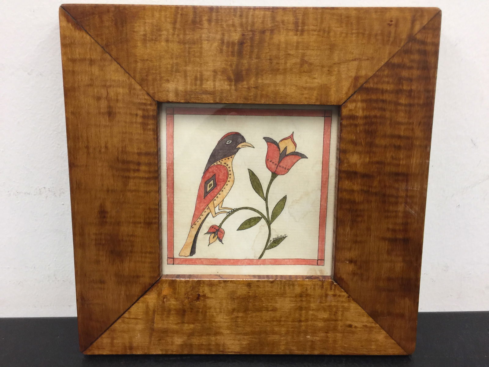 P. Golliot Watercolor Fraktur: bird on flower, signed on leaf, tiger maple frame. 7"x7".