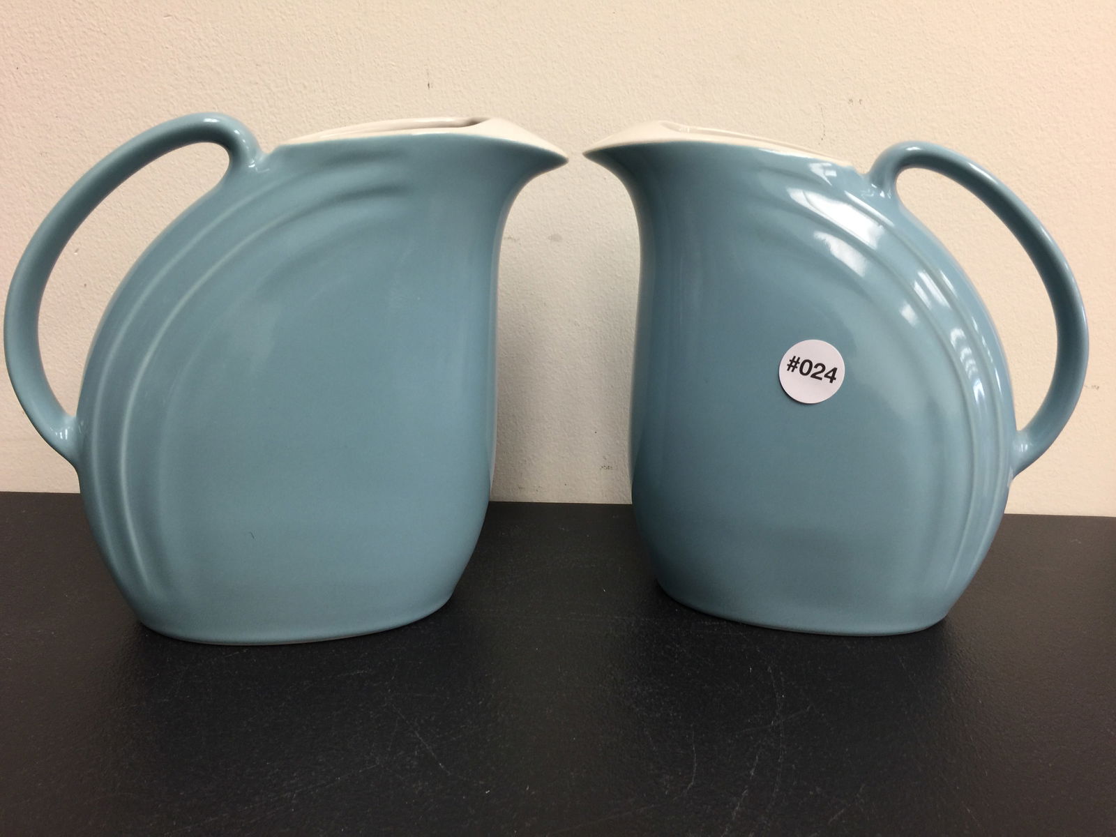 Pair of Hall Art Deco Pitchers: 8" x 8". Signed on bottom.