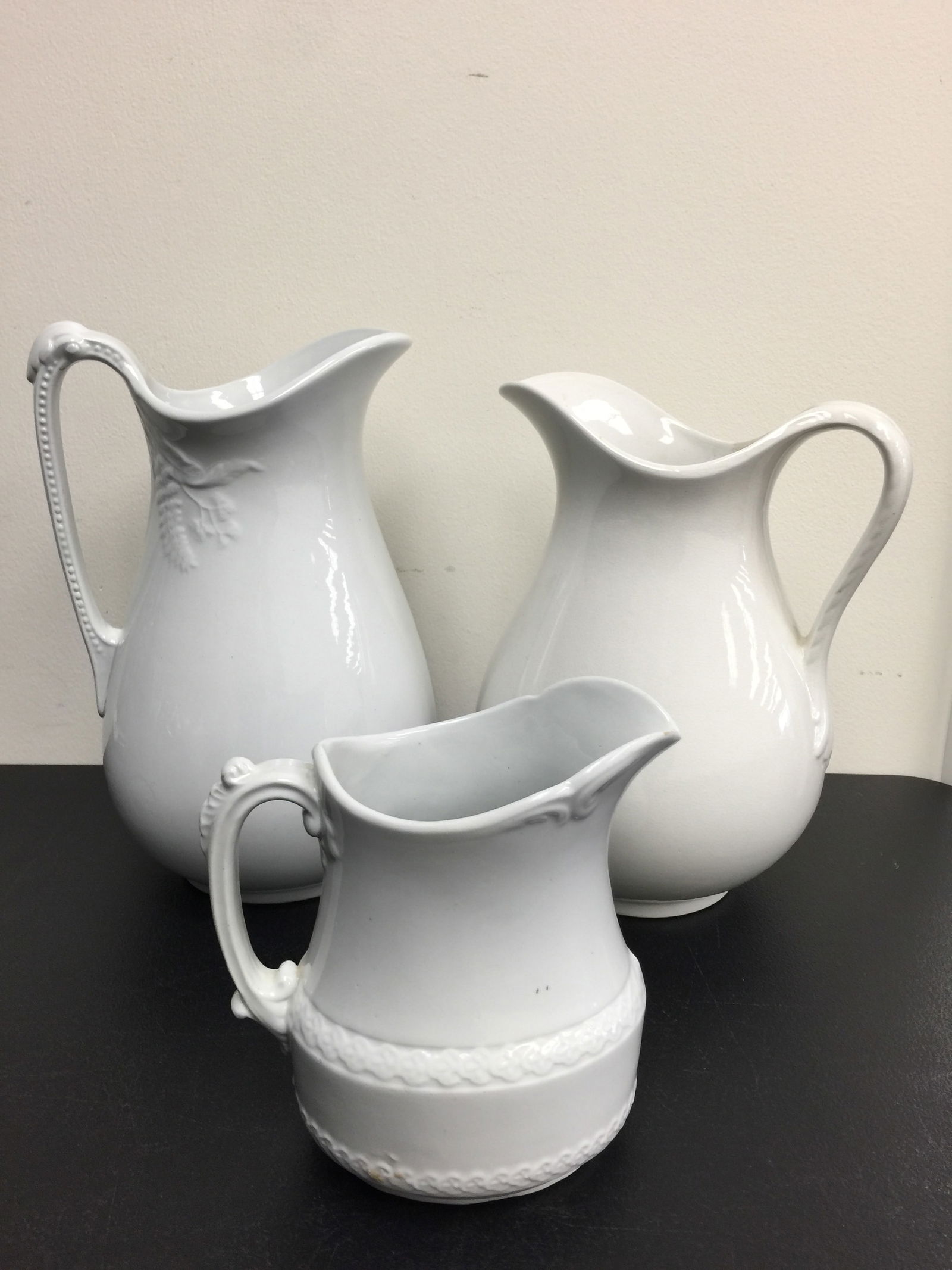 3 Ironstone Pitchers: Tallest 12", shortest 7".