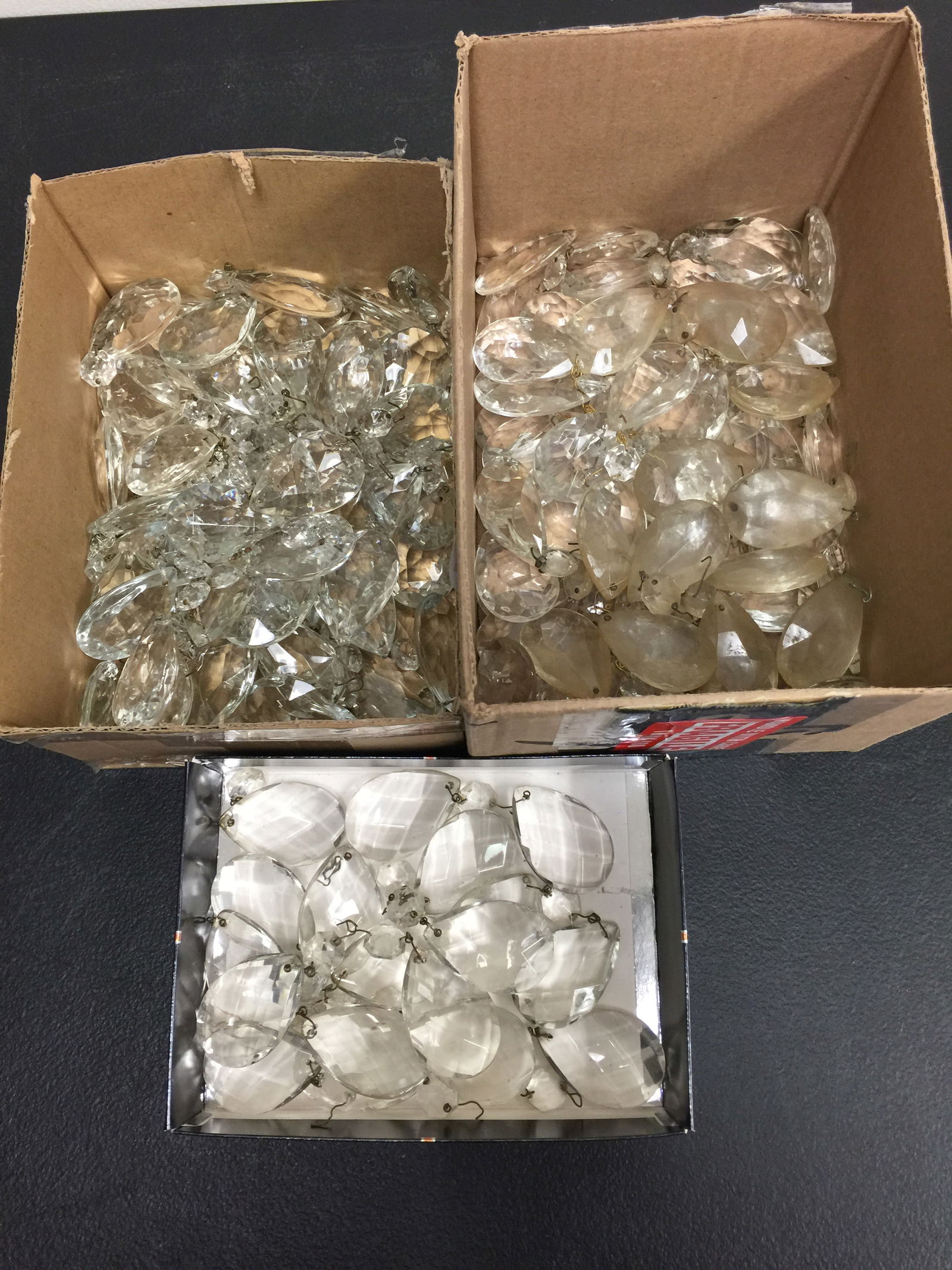 Glass Prisms: At least three different patterns. One pattern 2" L.