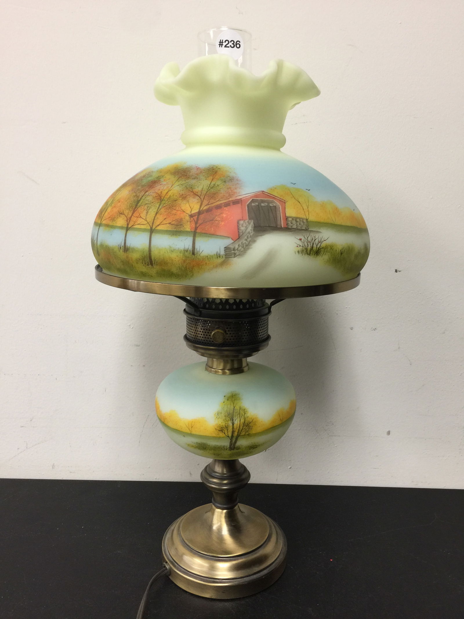 Fenton Covered Bridge Lamp: 21" x 10", shade artist signed on interior, numbered 147 of 150