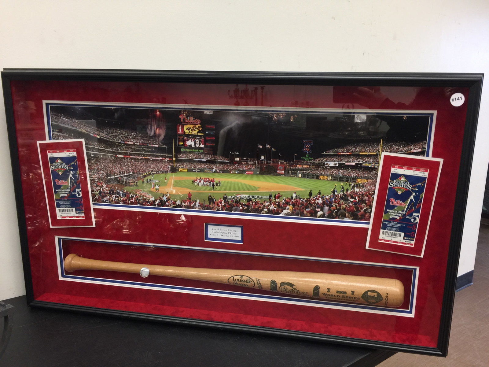 2008 Phillies World Series Display: Includes bat, game tickets. Frame 42" x 24". Has COA on back. 5127/10000.