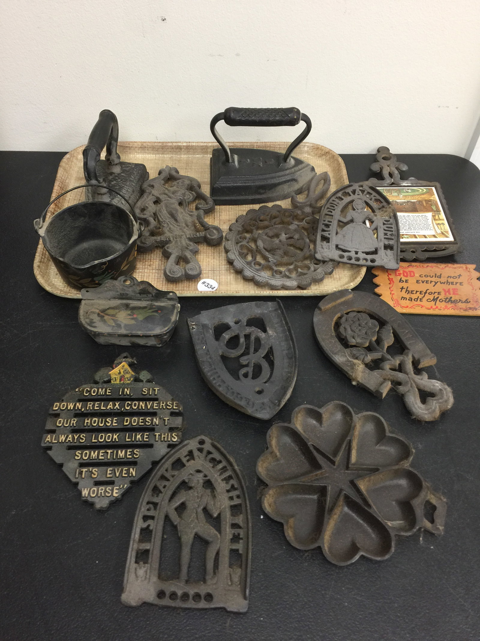 Cast Iron Trivets Plus: Includes sat irons and more.