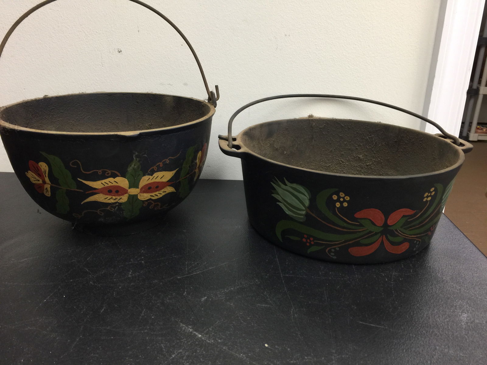 Pair of Cast Iron Painted Pots: Largest 12" W