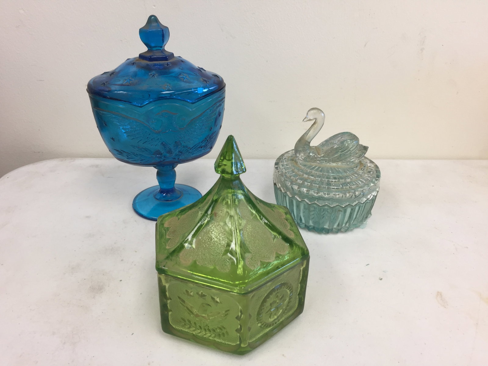 Glassware: Includes an 8" H covered compote with federal eagle decoration.